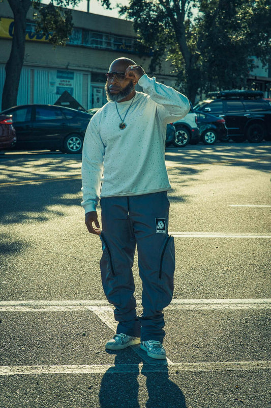 Parachute Cargo Pants | Avoir Couture worn outdoors, showcasing lightweight design and oversized pockets.